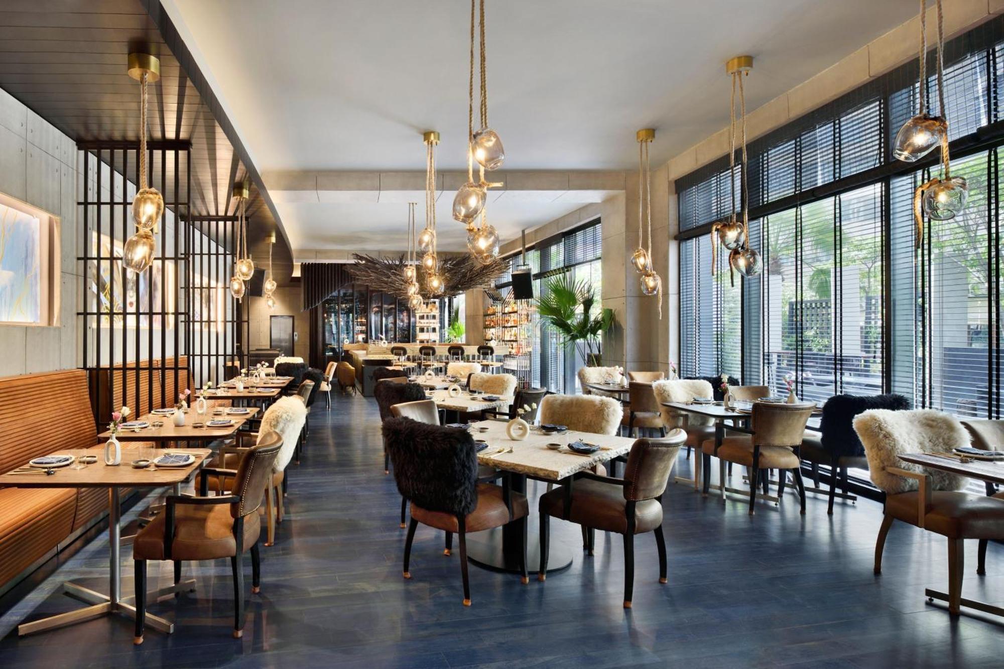 فندق جيه دبليو ماريوت هوتل نيودلهي آيروسيتي المظهر الخارجي الصورة The restaurant